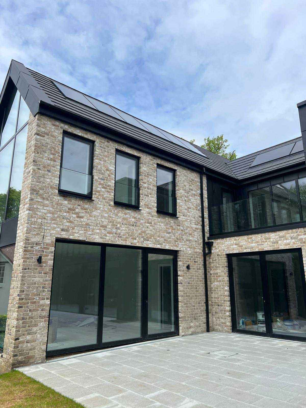 Contemporary house with rooftop solar array
